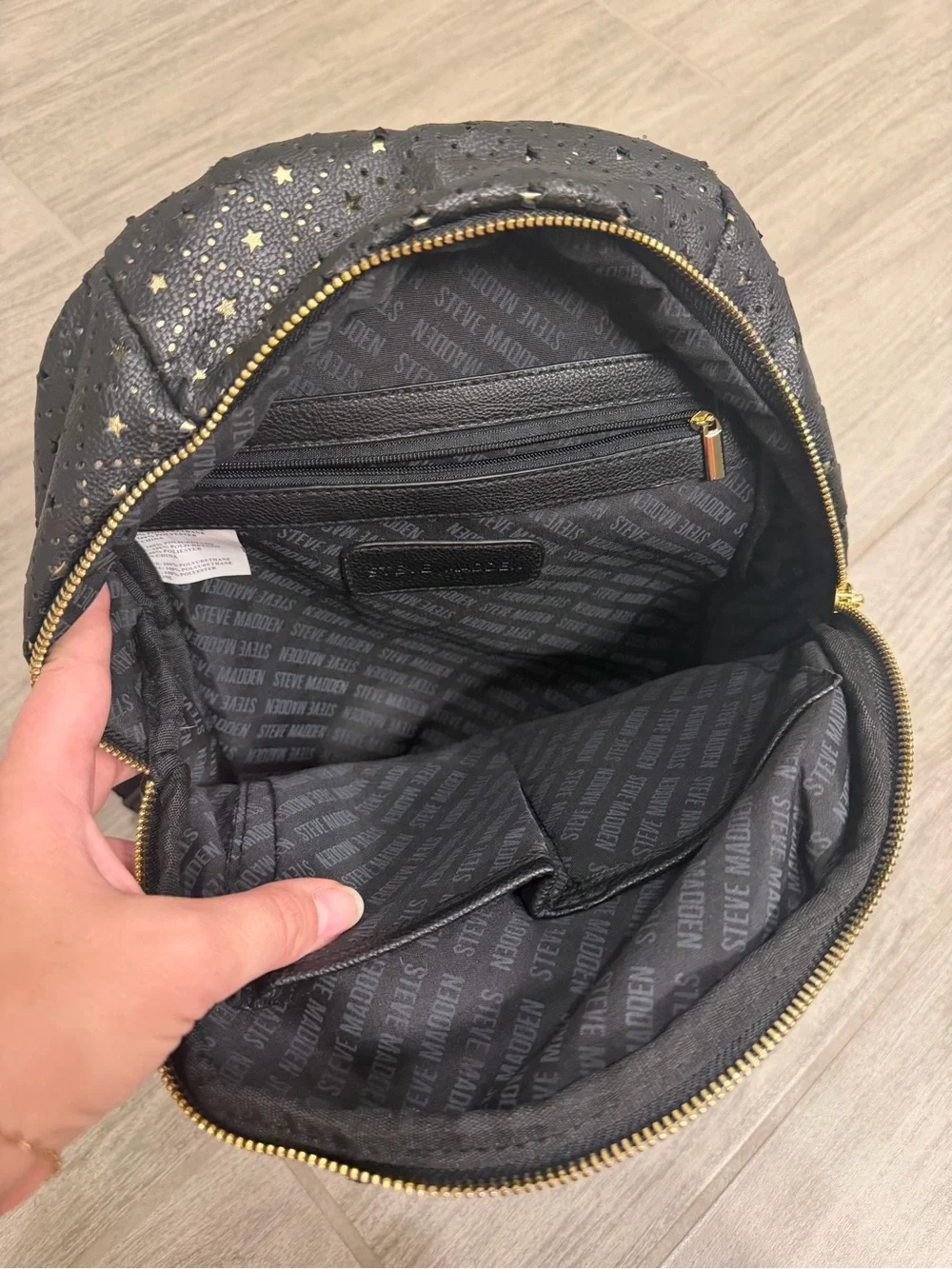 Steve Madden Black Mini Backpack with Gold Star Accents